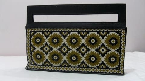Structured Clutch with Cut-Out Handle