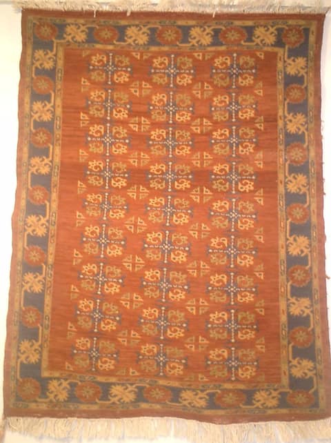 Hunza Ibex Design On Rust Field